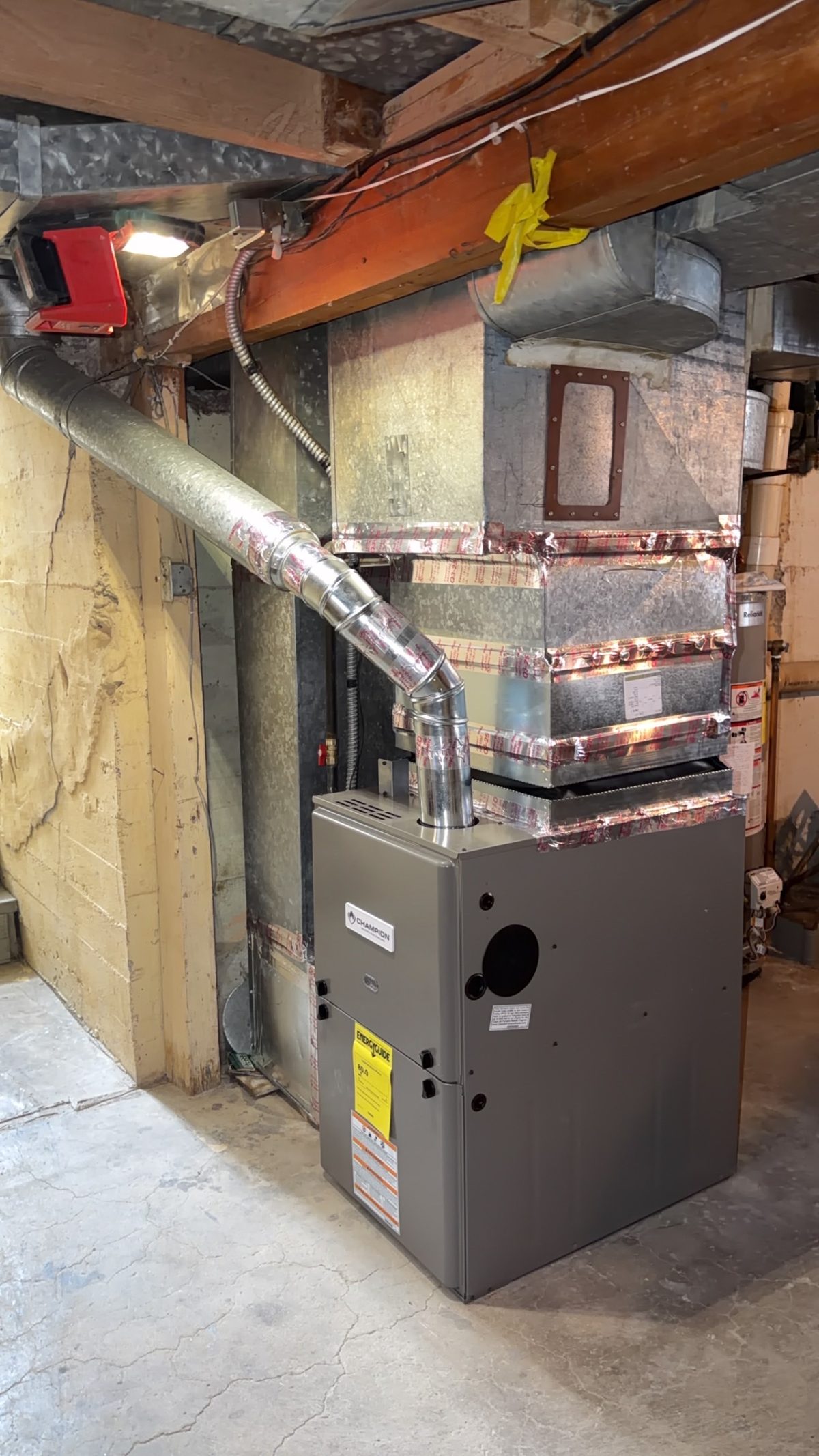 Champion furnace installation with ductwork by Wrangler Plumbing in Cody, WY