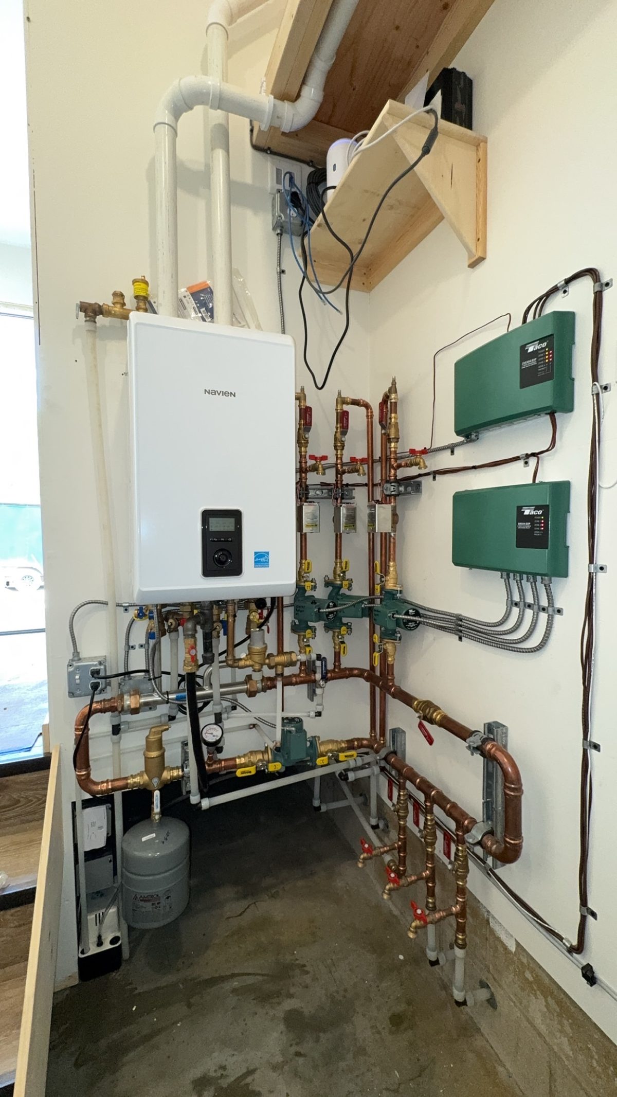 Navien boiler with Taco zone controllers installed by Wrangler Plumbing, Cody Wyoming