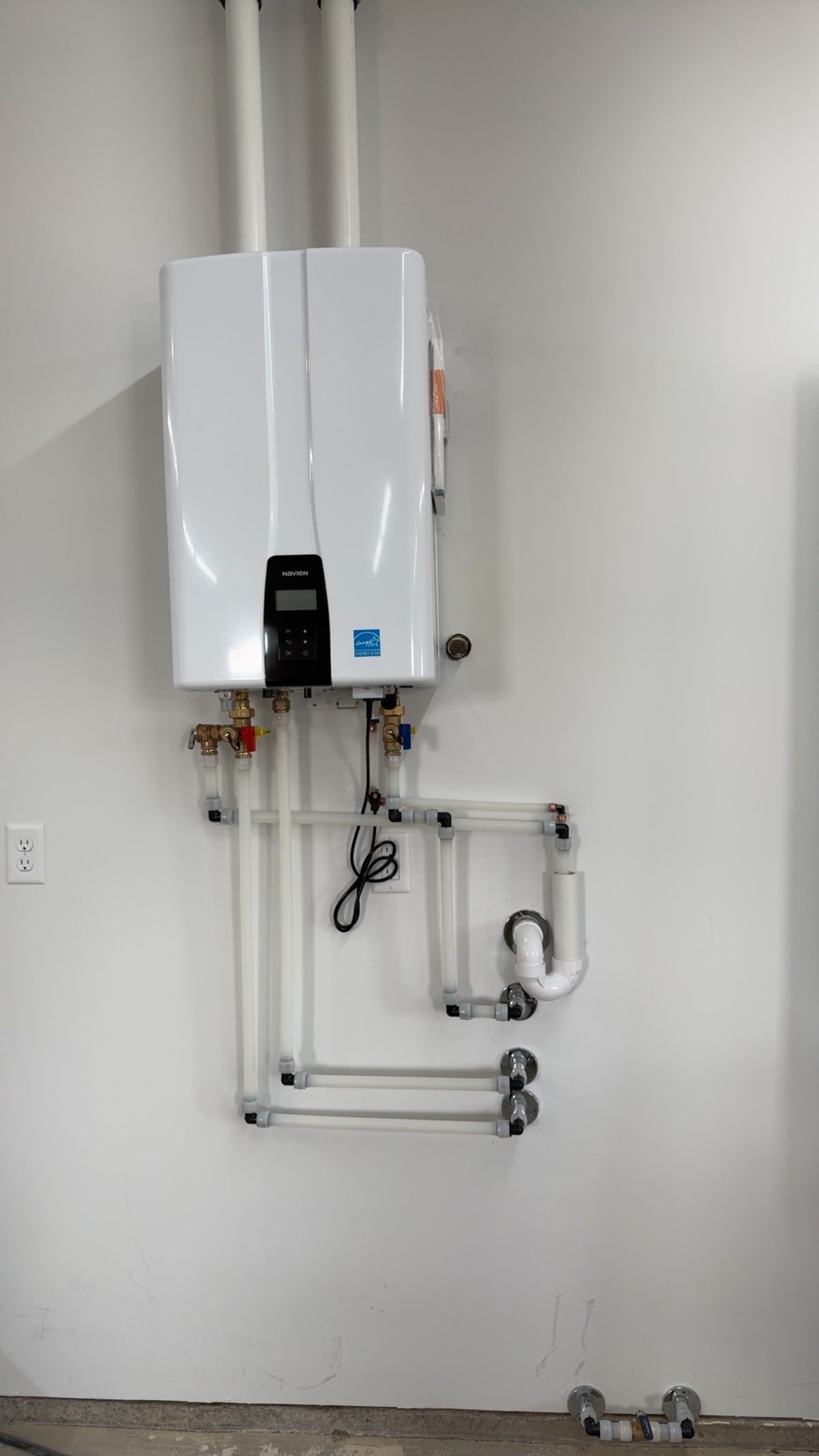 Navien tankless water heater installation by Wrangler Plumbing in Cody, Wyoming